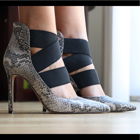 Vince Camuto Snake Skin Pumps With 